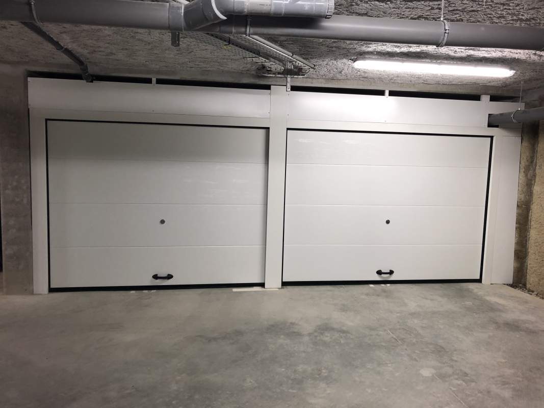 Photo de notre réalisation : Portes de garage sectionnelles